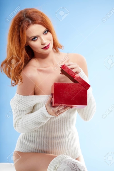 90175693-amazing-redhead-woman-with-christmas-gift-box
